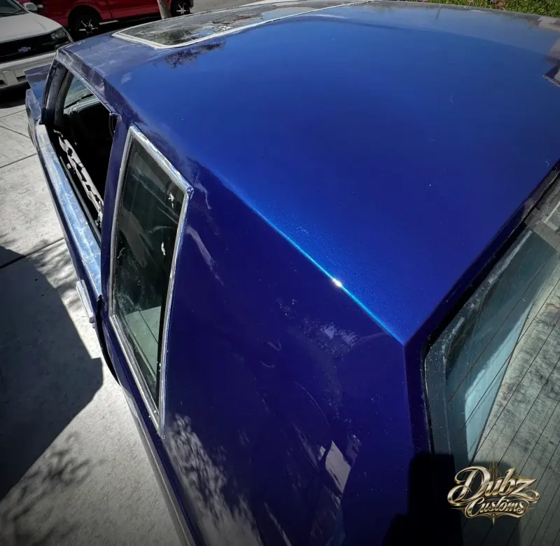 Glossy candy blue roof reflecting the sky