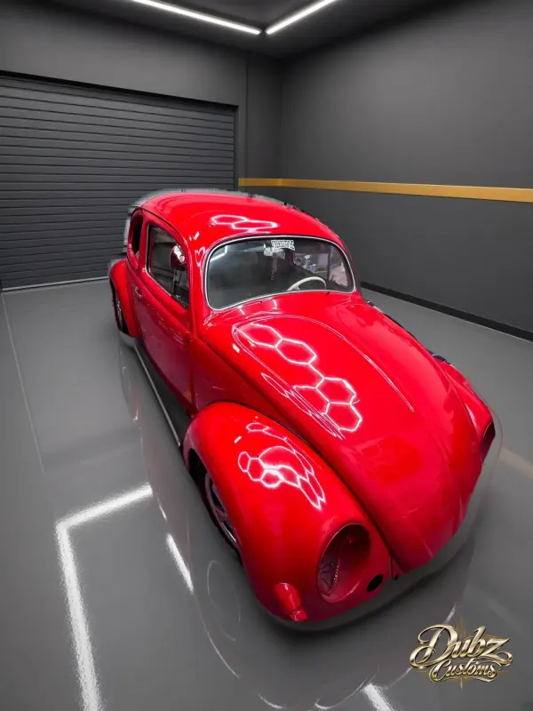 VW Beetle side view during body prep