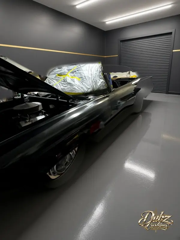 Gloss black 1959 Bel Air convertible with whitewall tires