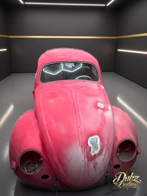 VW Beetle front end with body filler during prep